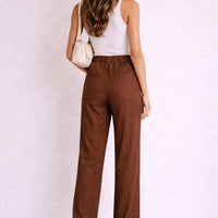 PANTALON DE LINO CON BOTON DORADO