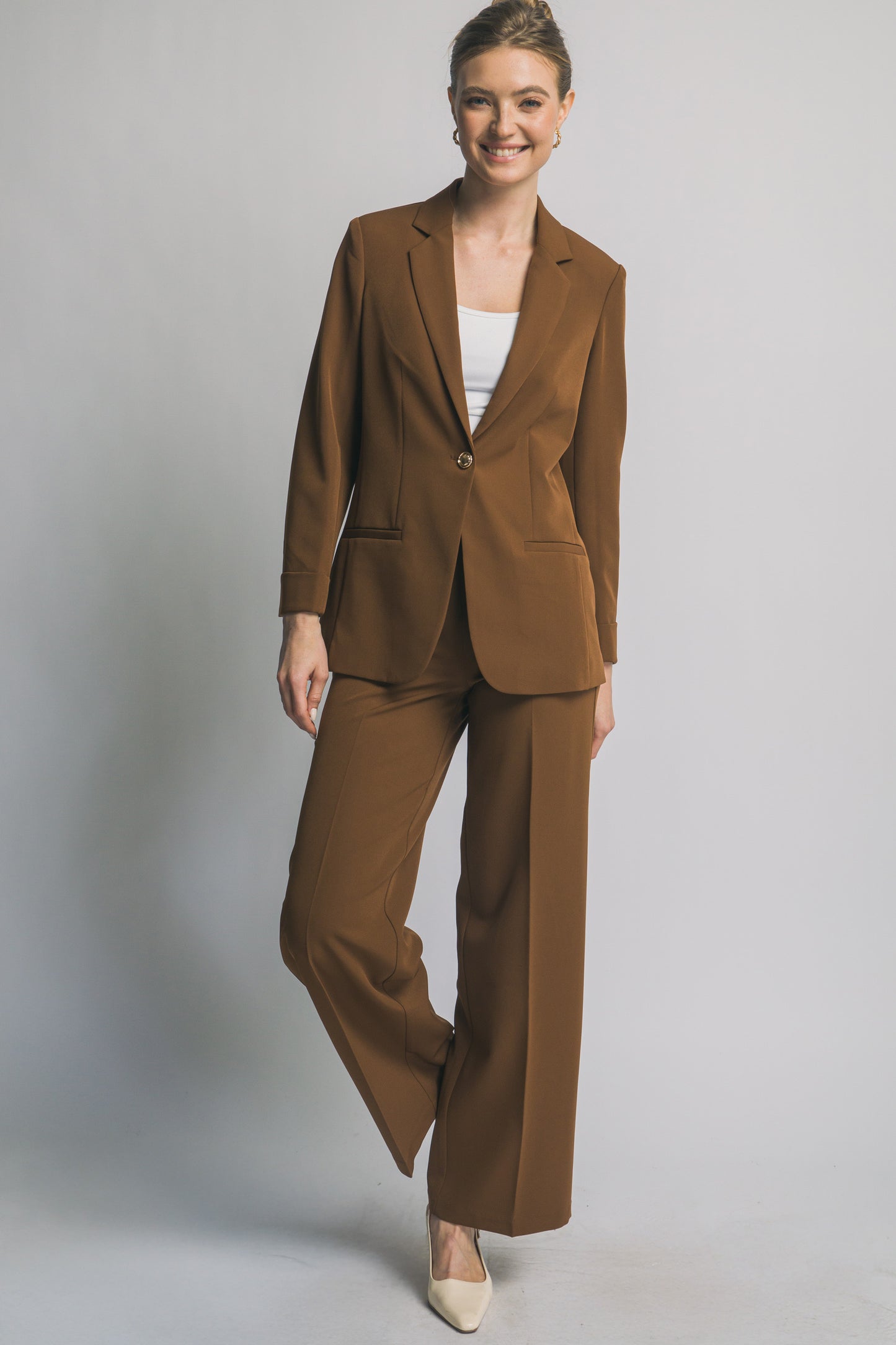 SACO CON BOTON DORADO