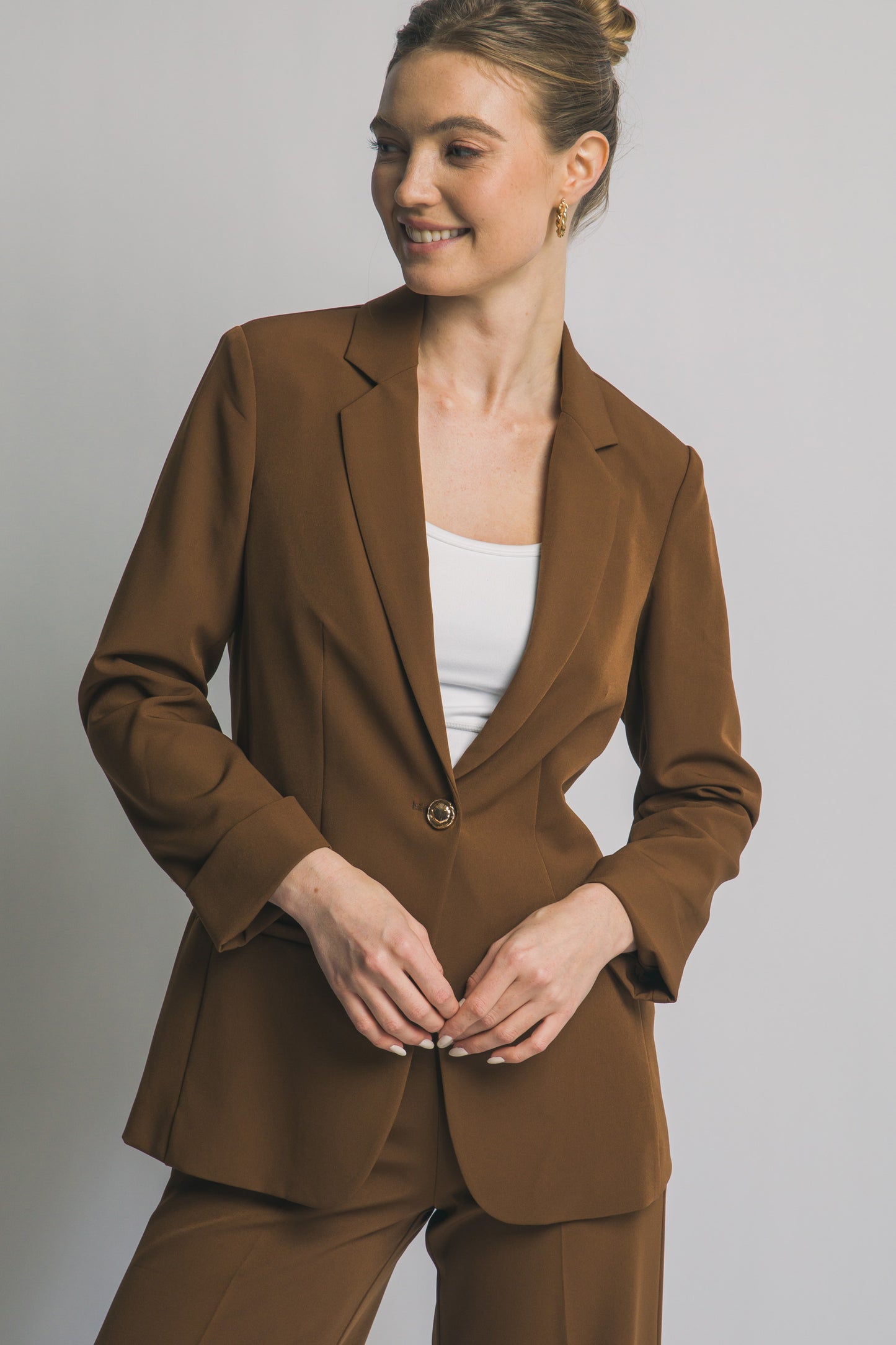 SACO CON BOTON DORADO