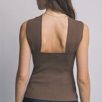 BLUSA CON DETALLE DORADO